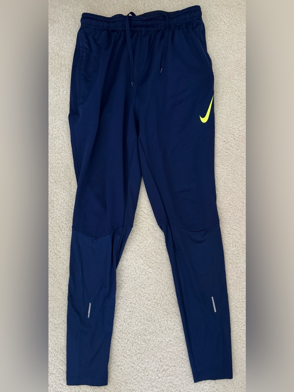 Nike men’s navy Joggers with Neon Yellow Swoosh
